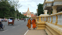 Buddhist monks on a street in Phnom Penh