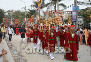 Boys in different clothes for the different forces of the Royal Army at the Do Temple Festival