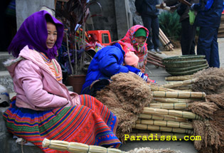 Hmong ladies with brooms