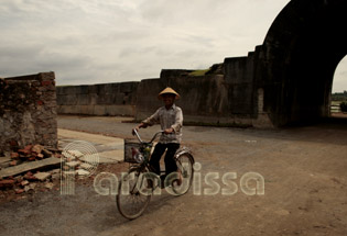 Boy enjoying fun cycling around the Ho Citadel in Thanh Hoa Province