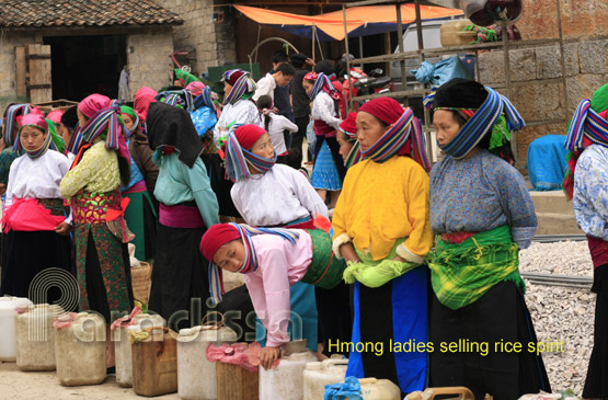 Hmong ladies selling wine at Dong Van Market