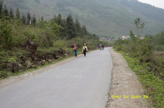 Ethnic ladies on the road near Quan Ba