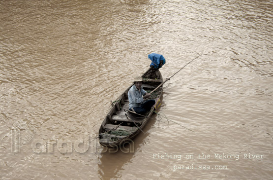 Fishing in the water of the Mekong River