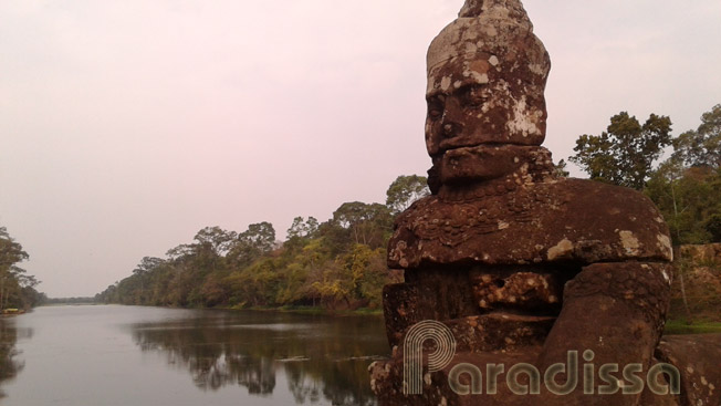 A mythical statue at the South Gate of Angkor Thom, Siem Reap