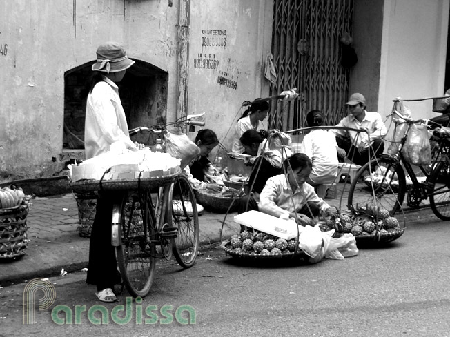 Street vendors in the Old Quarter of Hanoi Vietnam