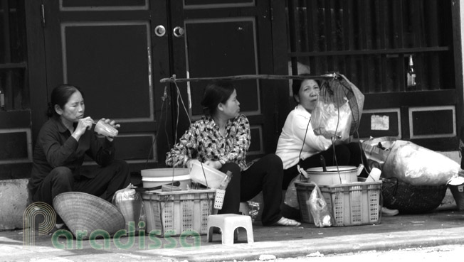 Ladies dining on a pavement