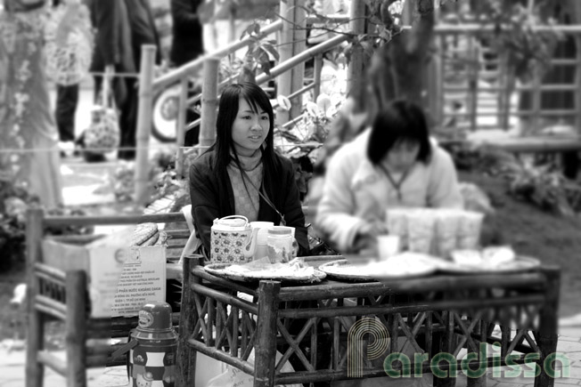Young girls selling tea by the Hoan Kiem Lake in Hanoi