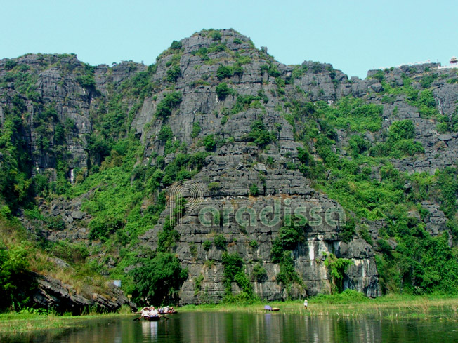 Rowing boats amid the sublime landscape of Tam Coc, Ninh Binh
