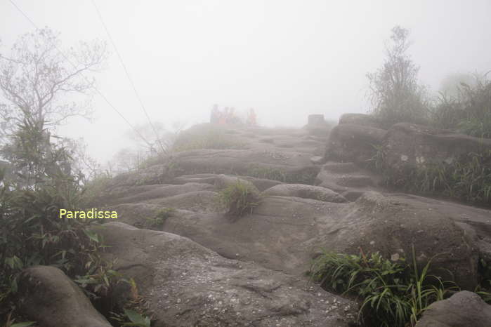 The rocky and steep path on the hiking trip to the summit of the Yen Tu Mountain