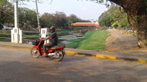 A Cambodian man on motorbike at Siem Reap