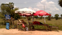 A sleeping vendor at sleep outside of Siem Reap City