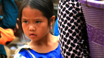 A little girl at Can Cau Market