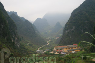 An amazing road snaking amid limestone mountains at Thai Phin Tung, Dong Van, Ha Giang