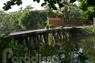 Nom Stone Bridge across the Nguyet Duc River