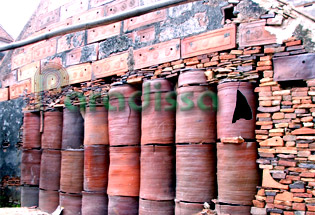 Wall of jars at Tho Ha Village