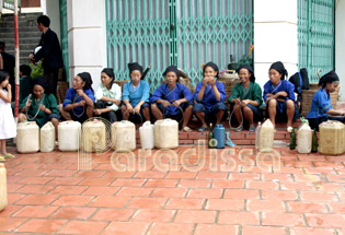 Nung ladies sell rice wine at Hoang Su Phi market