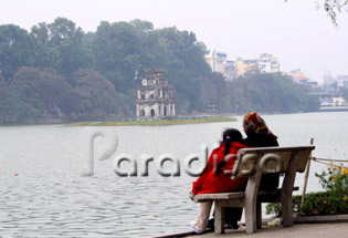 Grand daughter and Grandma by the Hoan Kiem Lake Grand daughter and Grandma by the Hoan Kiem Lake