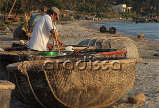 Fixing boats at Mui Ne Fishing Village