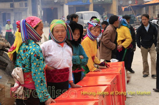 Hmong ladies selling wooden trunks at Dong Van Market