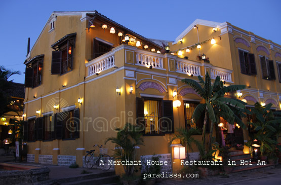 An old marchant house converted to a restaurant by the Thu Bon River in Hoi An Vietnam