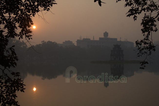 The Turtle Tower on the Hoan Kiem Lake in Hanoi at sunrise