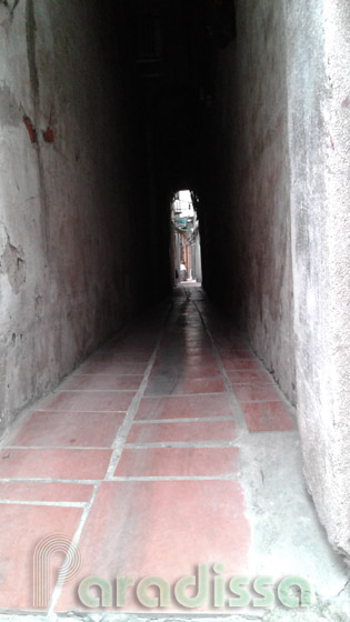 A tunnel-like alley in Hanoi Old Quarter