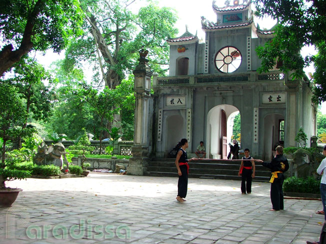 Practicing martial arts at the Quan Thanh Temple in Hanoi, Vietnam