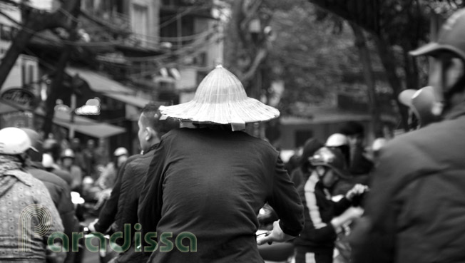 A worker hurrying in the traffic