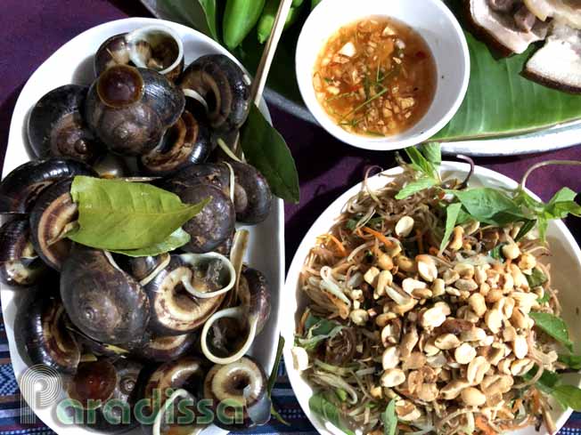 Snails steamed with lemon leaves and banana bud salad