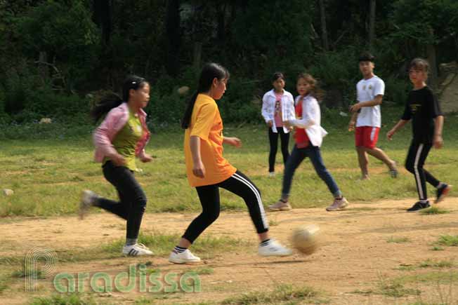Girls playing football at Pa Co, Hoa Binh