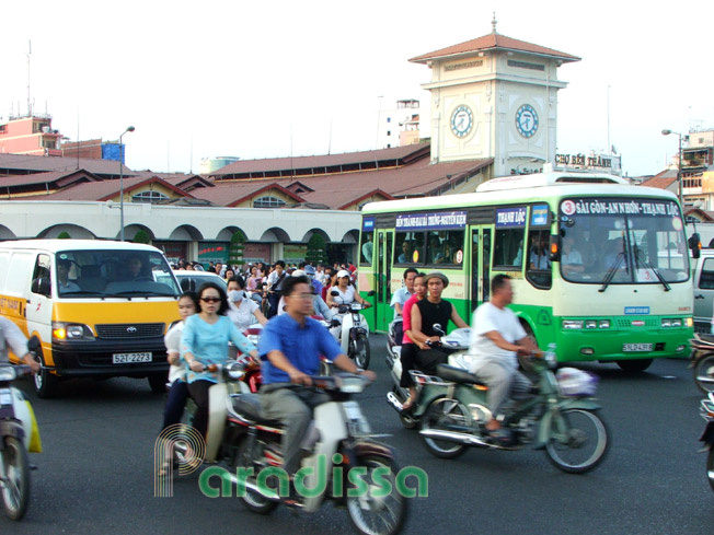 Traffic in front of the Ben Thanh Market in the center of Saigon Ho Chi Minh City Vietnam