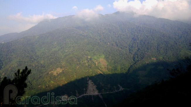 A view from the top of the Khau Pha Pass to the tiny road below