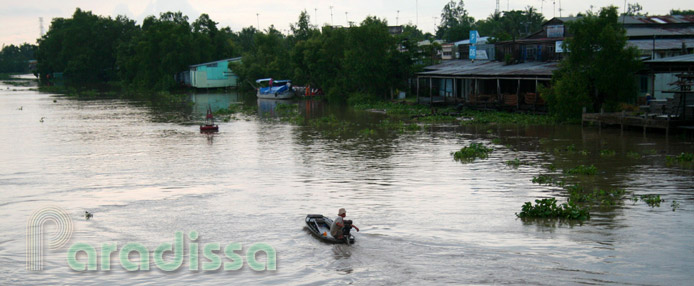 A little boat on the Mekong River at Bac Lieu A little boat on the Mekong River at Bac Lieu