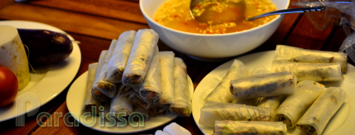 Preparing springrolls at the Cooking Class on Halong Bay