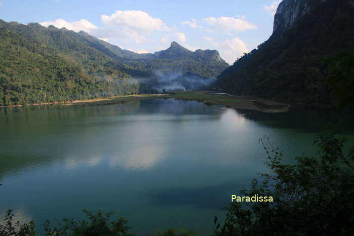 The serene water of the Ba Be Lake amid capivating mountains in Bac Kan Province of Vietnam