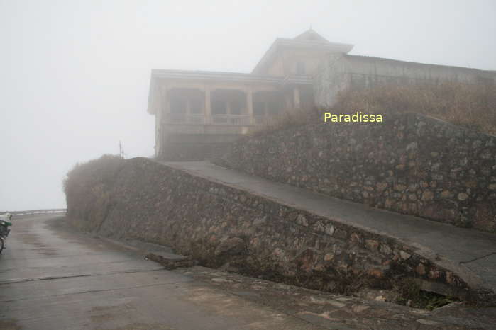 A French village in thick fog at the Mau Son Hill Station on the Mau Son Mountain, Loc Binh District, Lang Son Province