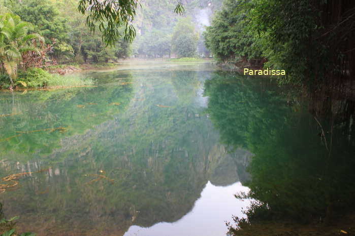 Serene lake at the base of the Mua Mountain