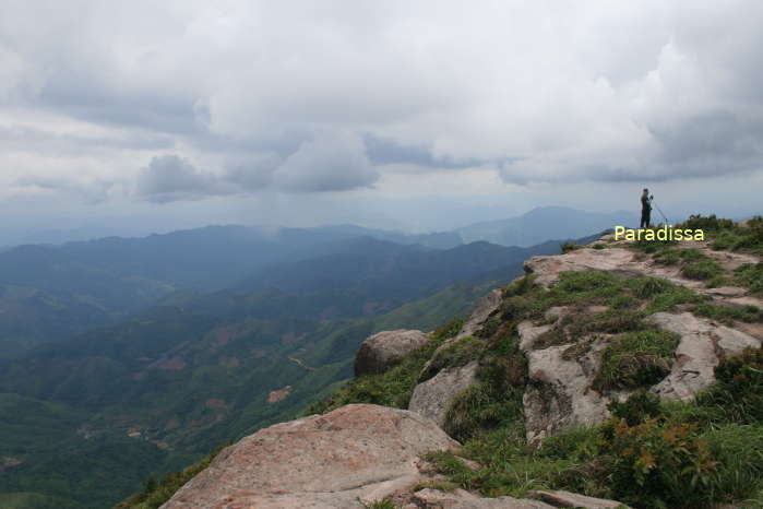 A captivating view of mountains around the peak of Mount Pha Luong