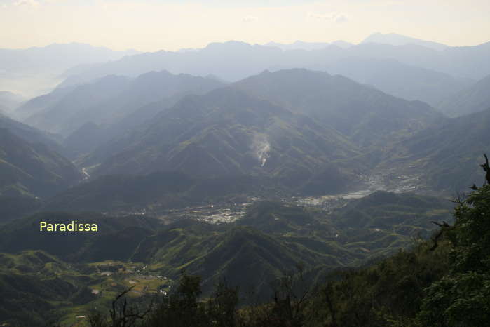 A view of mountains from the trekking trail to the summit of the Ta Xua Mountain